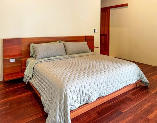 Hummingbird Room with red cedar headboard