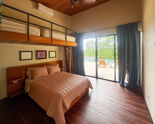 Monkey Room queen with loft bunk and deck access
