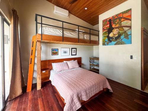 Bedroom with sliding doors to the deck