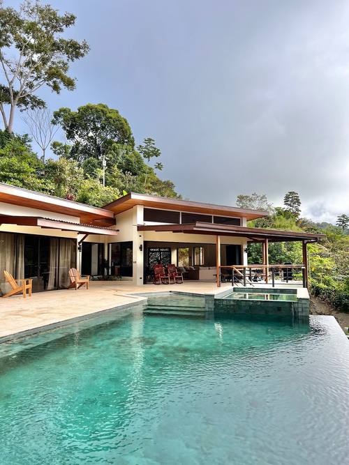 Pool and villa from across the water