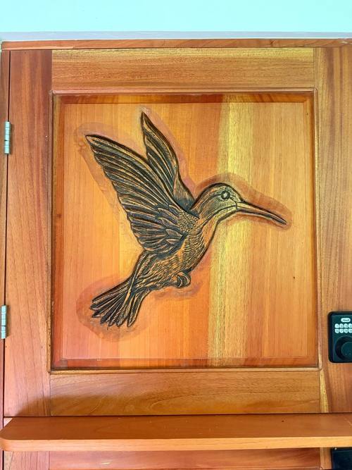 Hand-carved cedar Hummingbird door