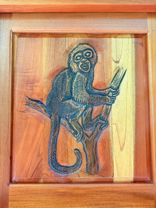 Hand-carved cedar Monkey door