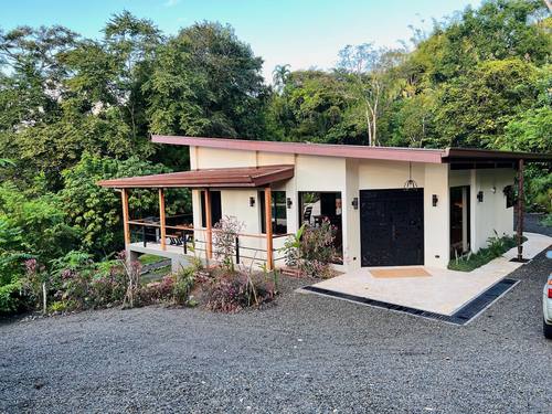 Front of the home with monstera gate