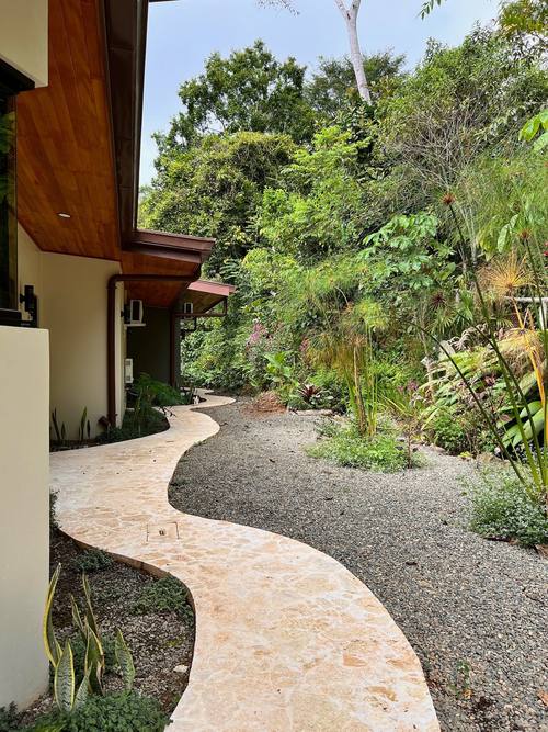 Coralina path through tropical gardens