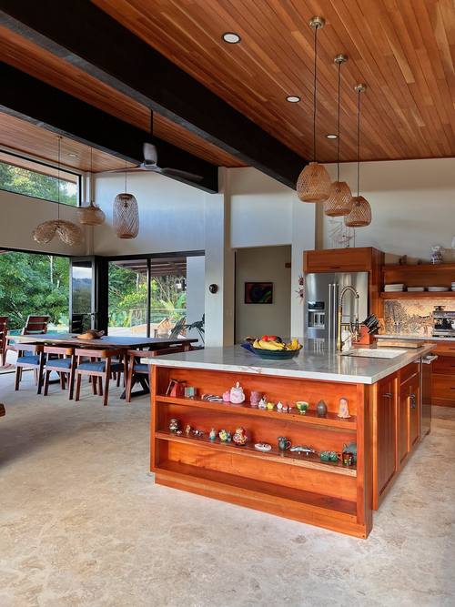 Dining table and kitchen island in the great room