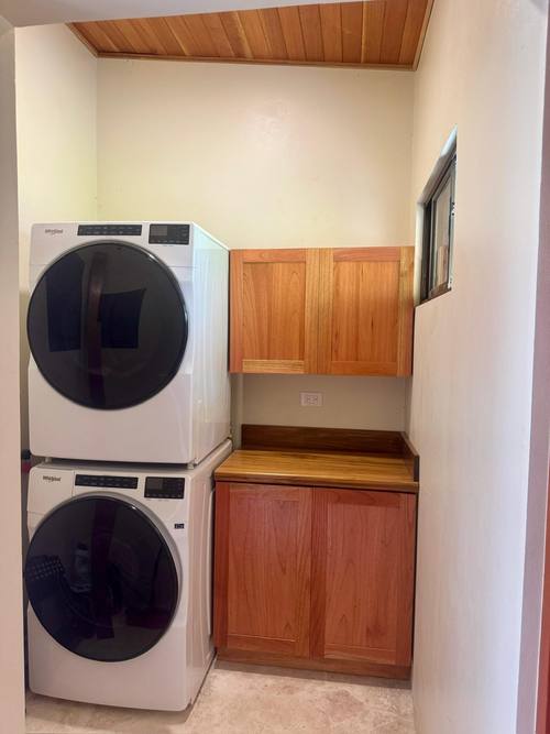 Laundry room with cedar cabinetry