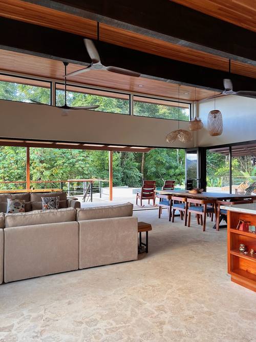 Sofas facing the open glass wall