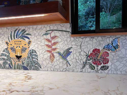 Mosaic of a jaguar, hummingbird, hibiscus and butterfly